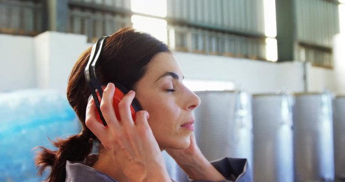 Worker wearing ear muff