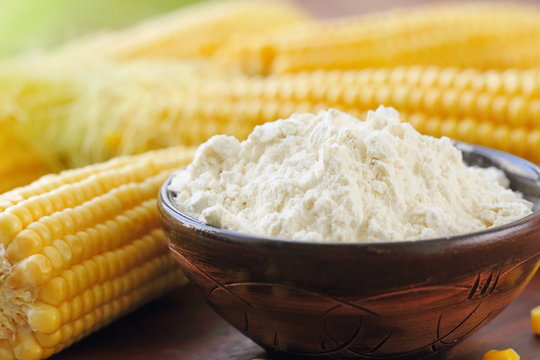 Corn flour and corn cob on the table