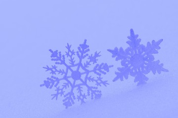 Decorative snowflake in the snow