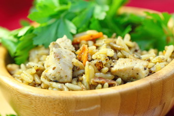 Pilaf with meat, vegetables and herbs.