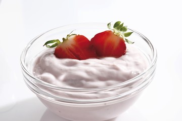 Strawberry yogurt in a glass bowl