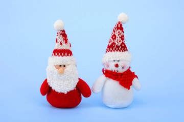 Santa Claus and snowman made of fabric, plush