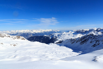 Fototapeta na wymiar Mountain panorama with snow and blue sky in winter in Stubai Alps, Austria