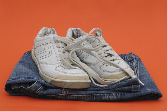 Old sneakers and jeans