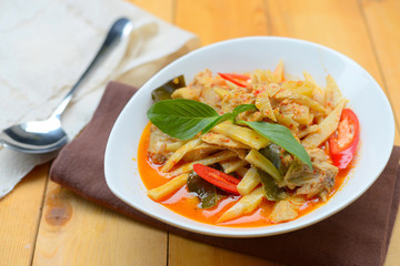 spicy bamboo shoot with chicken in coconut cream and red curry
