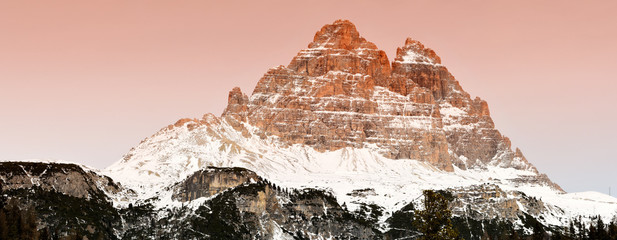 Tre Cime di Lavaredo at sunset in the Dolomites Mountains. Italy