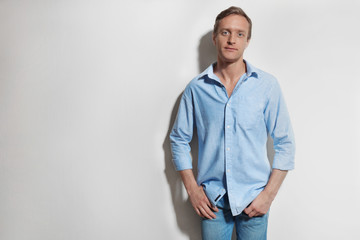 Fototapeta premium Handsome man on light background