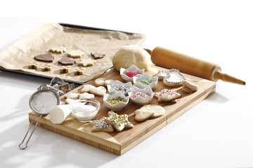 Fototapeta na wymiar Christmas bakery, baking scene with shortcrust pastry, cookies and baking decoration material