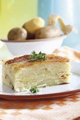 Potato casserole decorated with cress