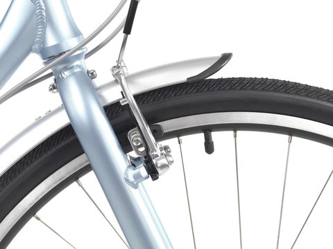 Closeup of front rim brakes of a bicycle