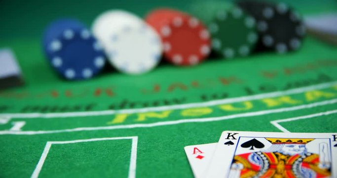 Playing cards, dices and casino chips on poker table 