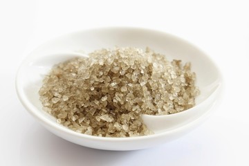 Green Hawaiian sea salt in a small porcelain bowl
