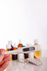 Seasonal flu tablets, medicines, thermometer