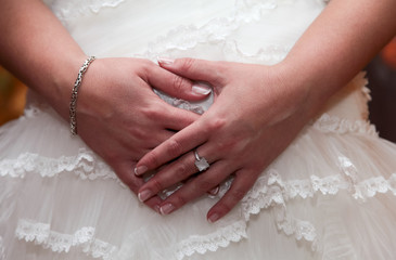 a young bride shows her engagement ring