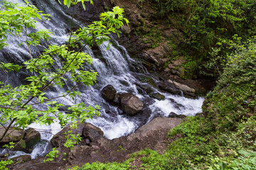 Waterfall Burbling From Rocks in Natural Park