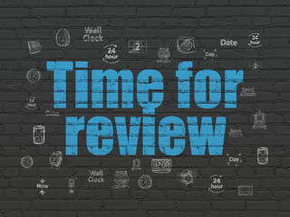 Time concept: Time for Review on wall background