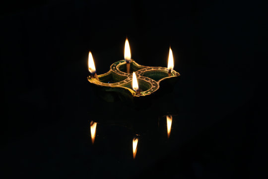 oil lamp lit during diwali