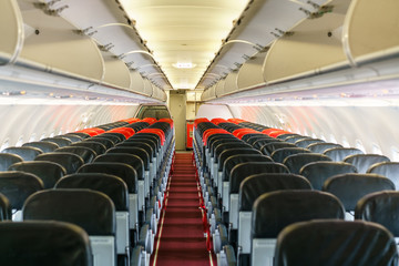 Fototapeta premium Empty passengers inside low cost airplane after plane landing