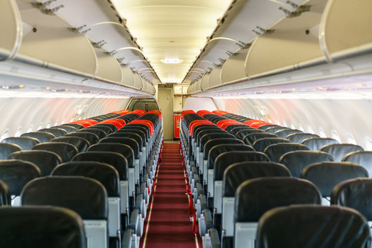 Empty passengers inside low cost airplane after plane landing