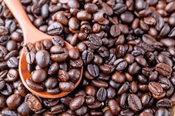 coffee beans on wooden background