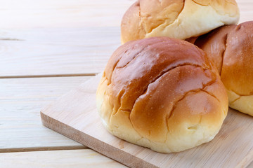 Butter roll on wooden background