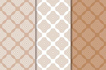 Brown and white geometric ornaments. Set of seamless patterns