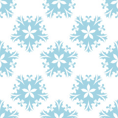 Blue flowers on white background. Ornamental seamless pattern