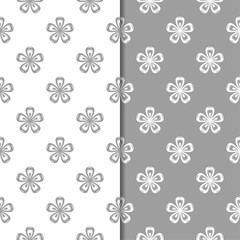 White and gray set of floral seamless patterns