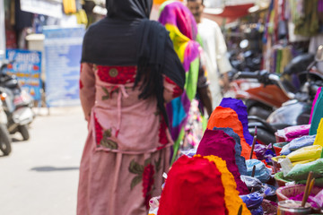 Fototapeta premium Colorful powder for sale on the festive occassion of Holi in India.