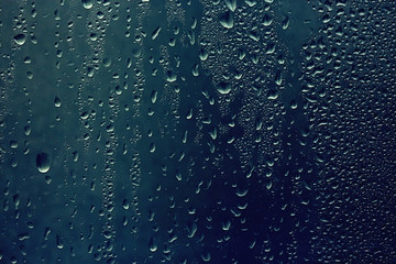 texture of a drop of rain on a glass wet transparent background