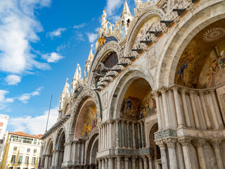 Fototapeta na wymiar View at Cathedral of San Marco (San Marco basilica) in Venice with blue sky, Italy.