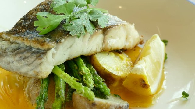 Sea bass steak with sauce
