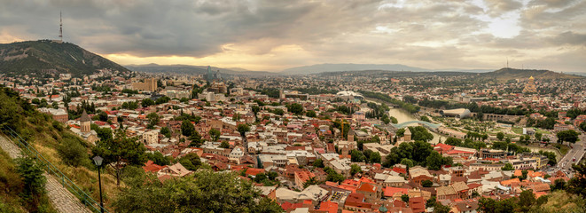 Panoramic view of Tbilisi, the capital of Georgia with old town and modern architecture during sunset. © Zdenar Adamsen