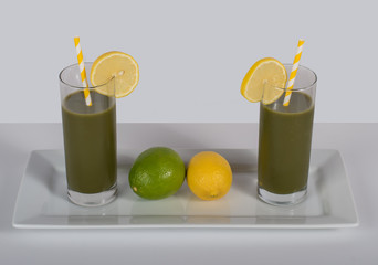 Green smoothie drinks with lemon and lime