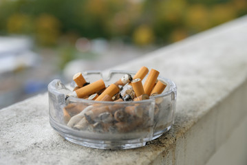 Cigarette butts in ashtray