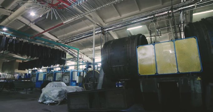 Factory of leather production.Rotating barrels for dyeing leather