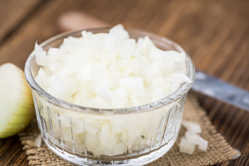 Fresh made Chopped white onions on a rustic background