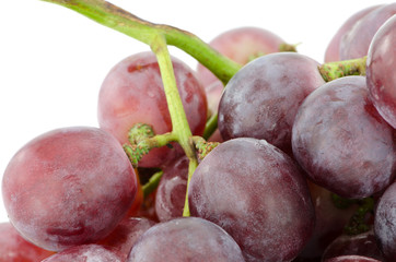 Close up of red grapes isolated on white background