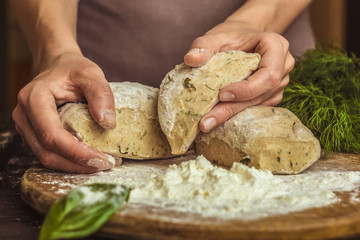 The chef's hands that knead the dough.
