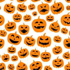 Seamless halloween pattern with pumpkin faces.