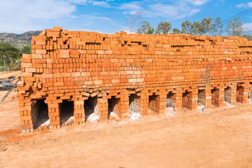 Furnace for firing indian bricks, Puttaparthi, Andhra Pradesh, India. Copy space for text.