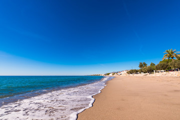 Fototapeta na wymiar Sand beach in Miami Platja, Tarragona, Catalunya, Spain. Copy space for text.