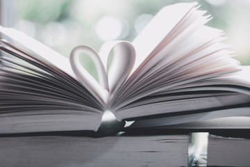 A book open in heart shape