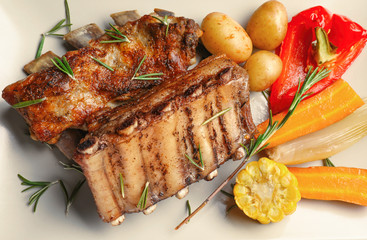 Plate with grilled ribs, closeup