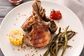 Plate with grilled meat, closeup