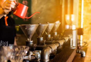 Drip brewing, filtered coffee, or pour-over is a method which involves pouring water over roasted, ground coffee beans contained in a filter.