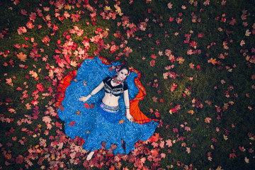 Fototapeta premium girl in a blue dress. aerial view