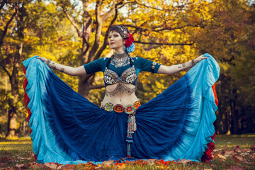 tribal dancer in a blue dress
