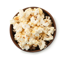 Wooden bowl with popcorn on white background