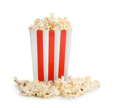 Paper box and popcorn on white background